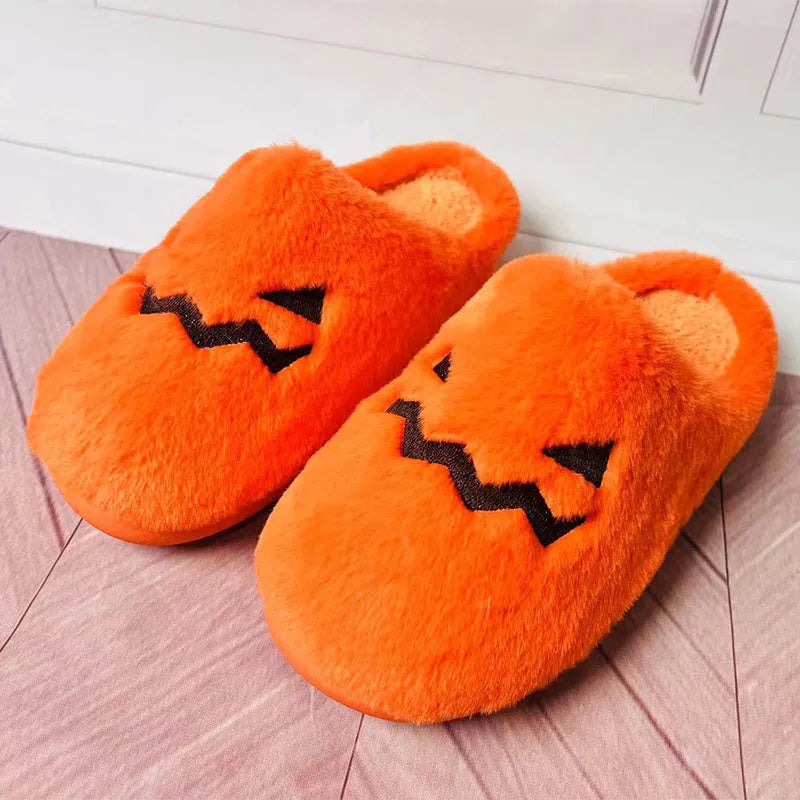 Orange Halloween pumpkin slippers with plush lining and non-slip PVC soles