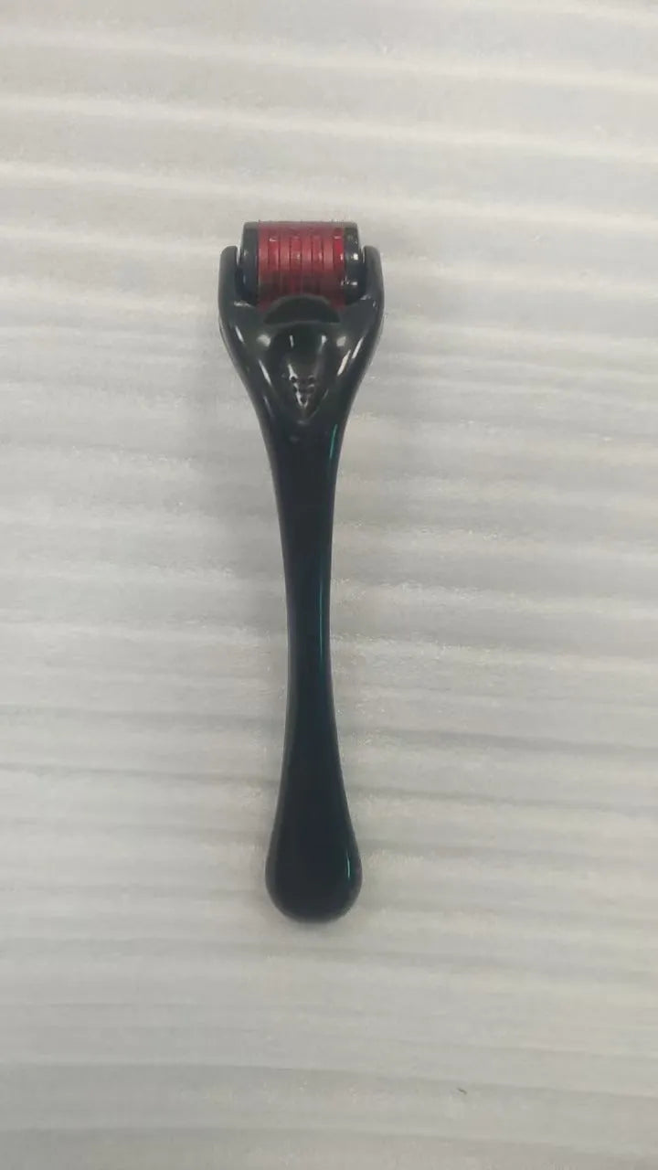 Professional 540 needle dermaroller for mechanical font with coloured handle and wheel, showing sterile stainless steel needles.