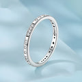 Moss Password I Love You oxidised black sterling silver ring on a simple bracelet band.