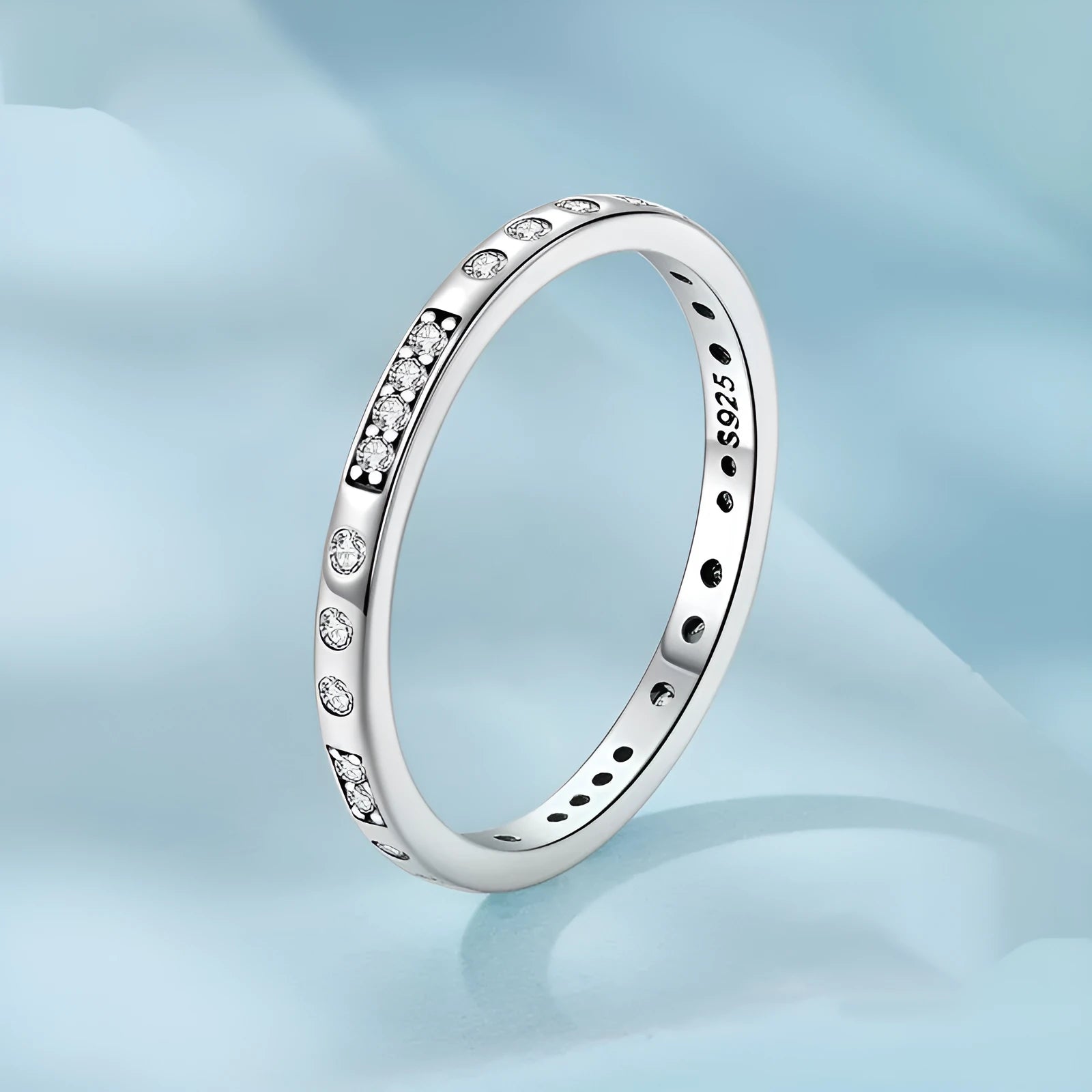 Moss Password I Love You oxidised black sterling silver ring on a simple bracelet band.