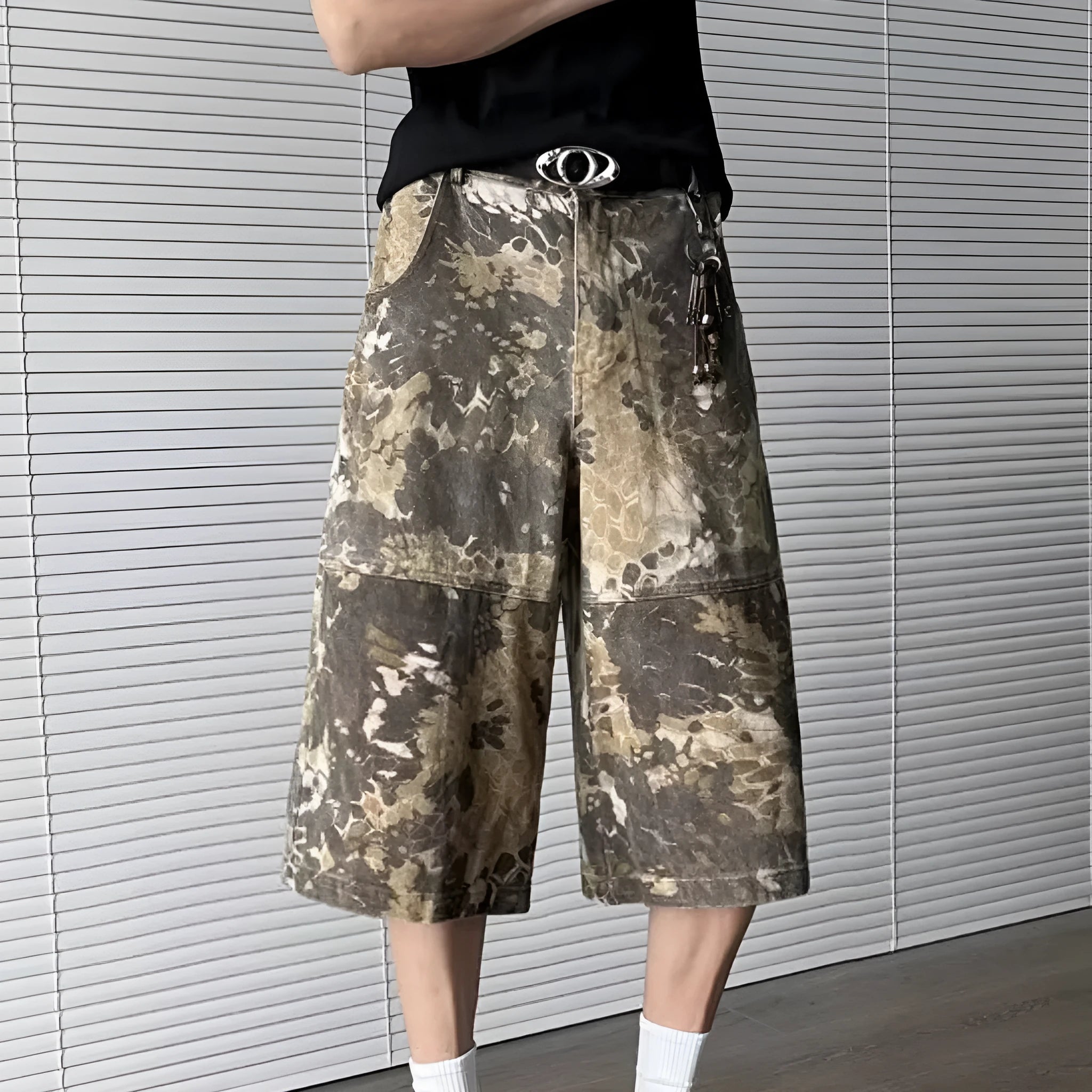Yellow denim jeans with snake camouflage pattern, cropped length design