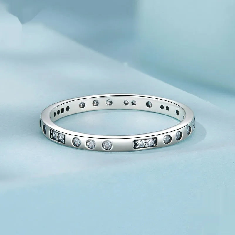 Moss Password I Love You oxidised black sterling silver ring on a simple bracelet band.