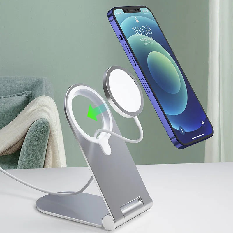 Silver vertical adjustable magnetic car phone mount for iPhone 12 series on a dashboard
