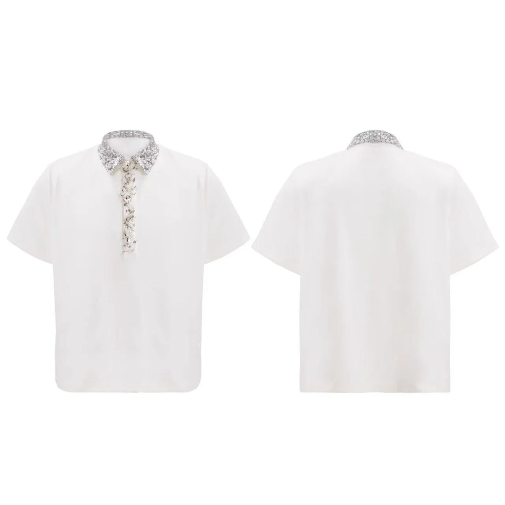 Man's black loose polo t-shirt with embroidery sequins detail and a square collar.