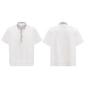 Man's black loose polo t-shirt with embroidery sequins detail and a square collar.