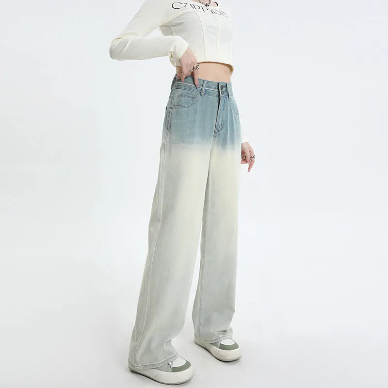 Women's gradient blue straight-leg denim trousers showing wide-leg design