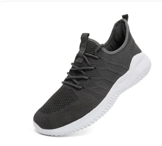 Men's black and white breathable mesh sneakers with lace-up closure and round toe design