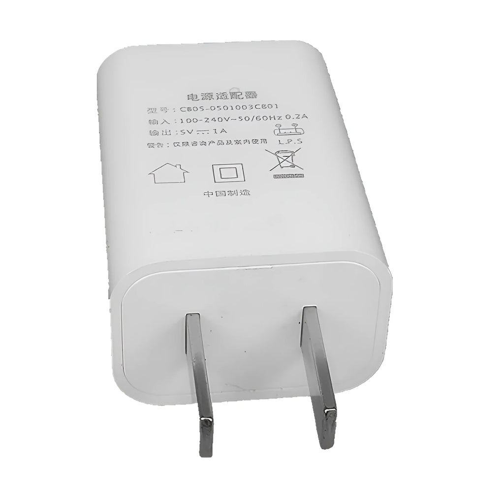 Thin white 5V 1A USB charger with international plug pins for mobile phones