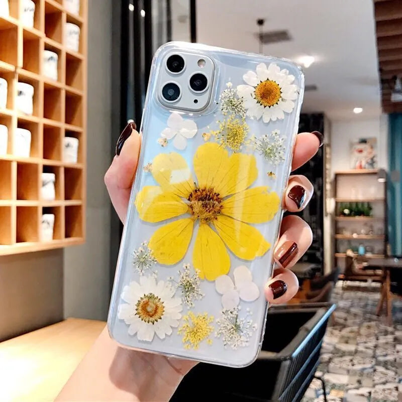 Floral TPU phone case with large pink and yellow flower designs for iPhone models