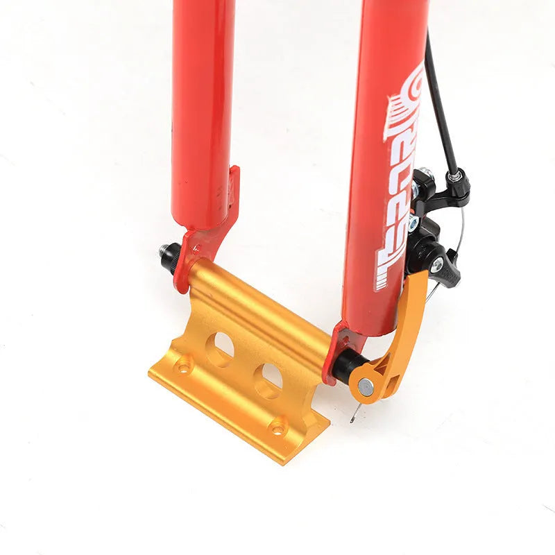 Silver metal quick release bicycle clamp for front fork accessory mounting.