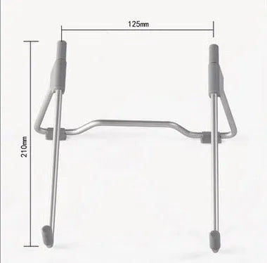 Grey aluminium and plastic universal stand holding a mobile phone and a laptop on a desk