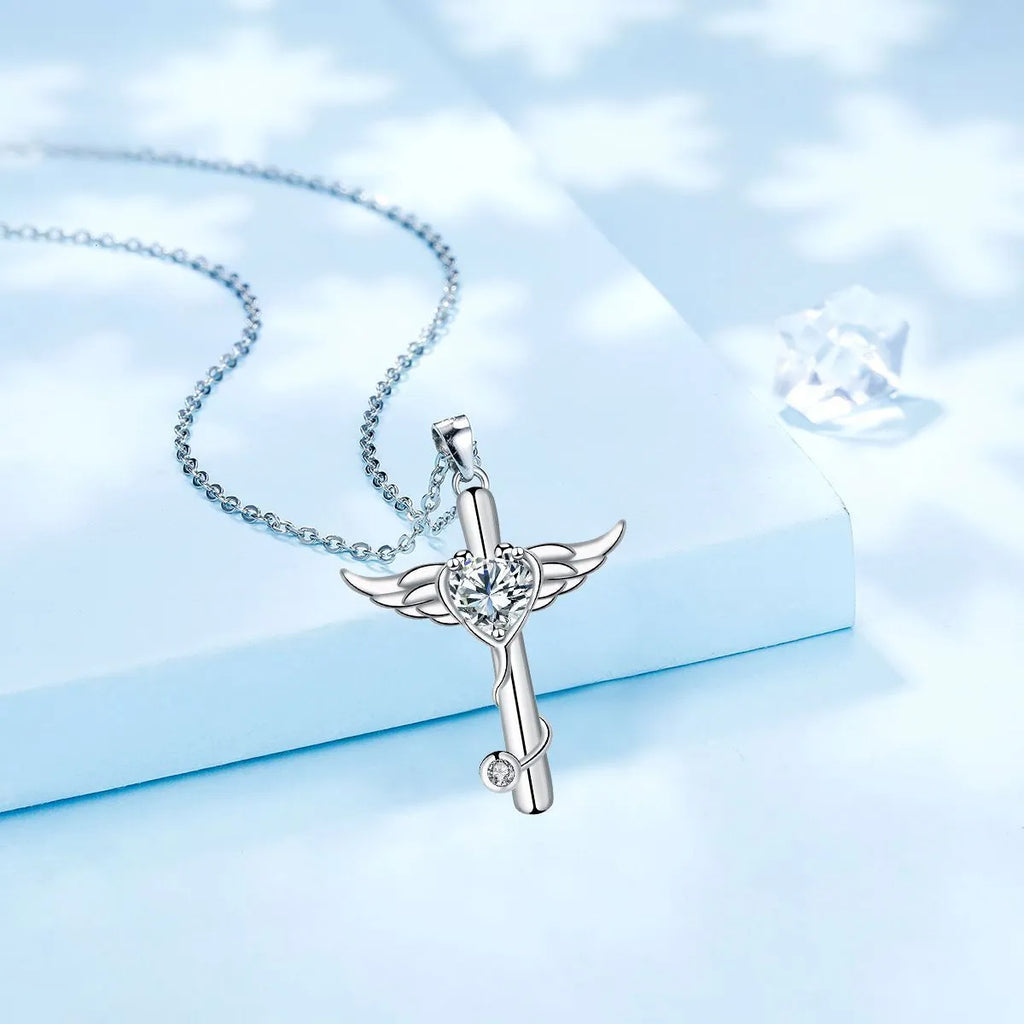 Silver-tone angel wings cross stethoscope necklace with diamond accent on copper chain