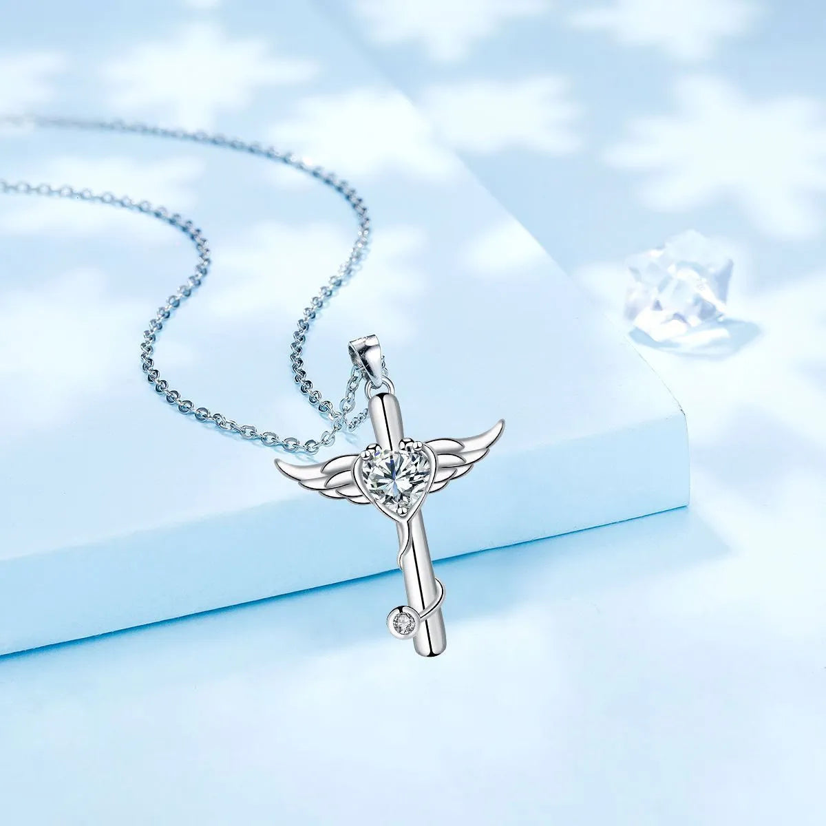 Silver-tone angel wings cross stethoscope necklace with diamond accent on copper chain