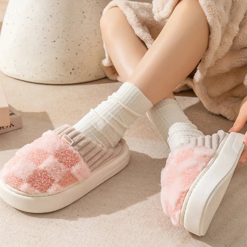 Women's plaid patterned plush slippers with coral velvet upper and non-slip PVC sole in coffee colour.