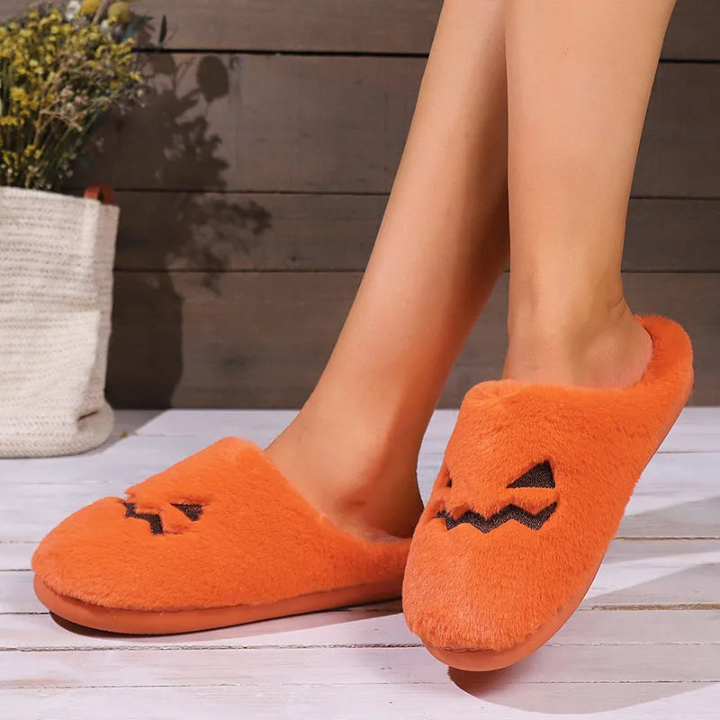 Orange Halloween pumpkin slippers with plush lining and non-slip PVC soles
