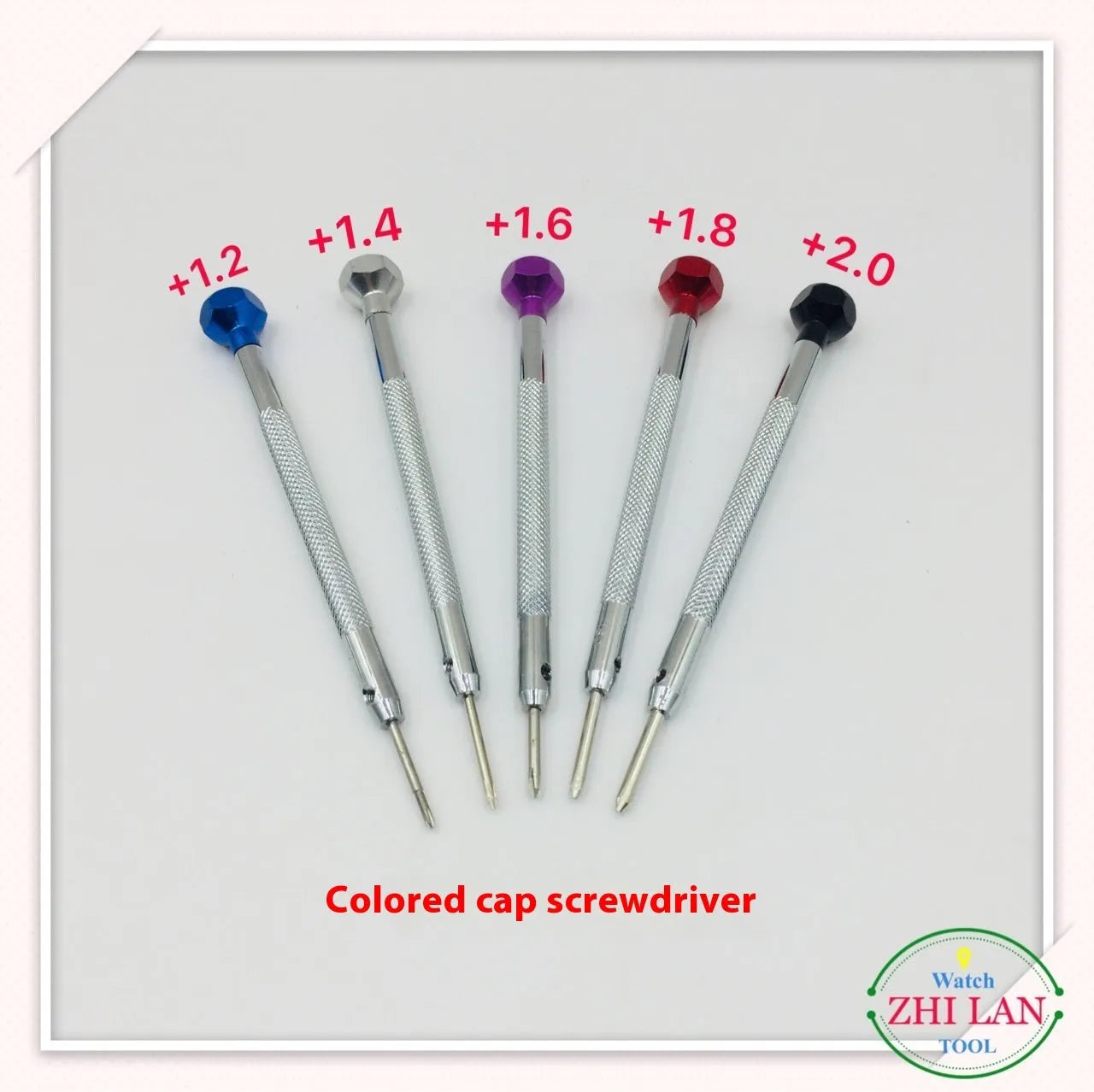 Six colour-coded watch repair screwdrivers with copper handles arranged in aluminium case