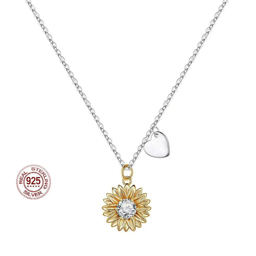 925 silver adjustable sunflower necklace with daisy petal pendant on a cross chain.