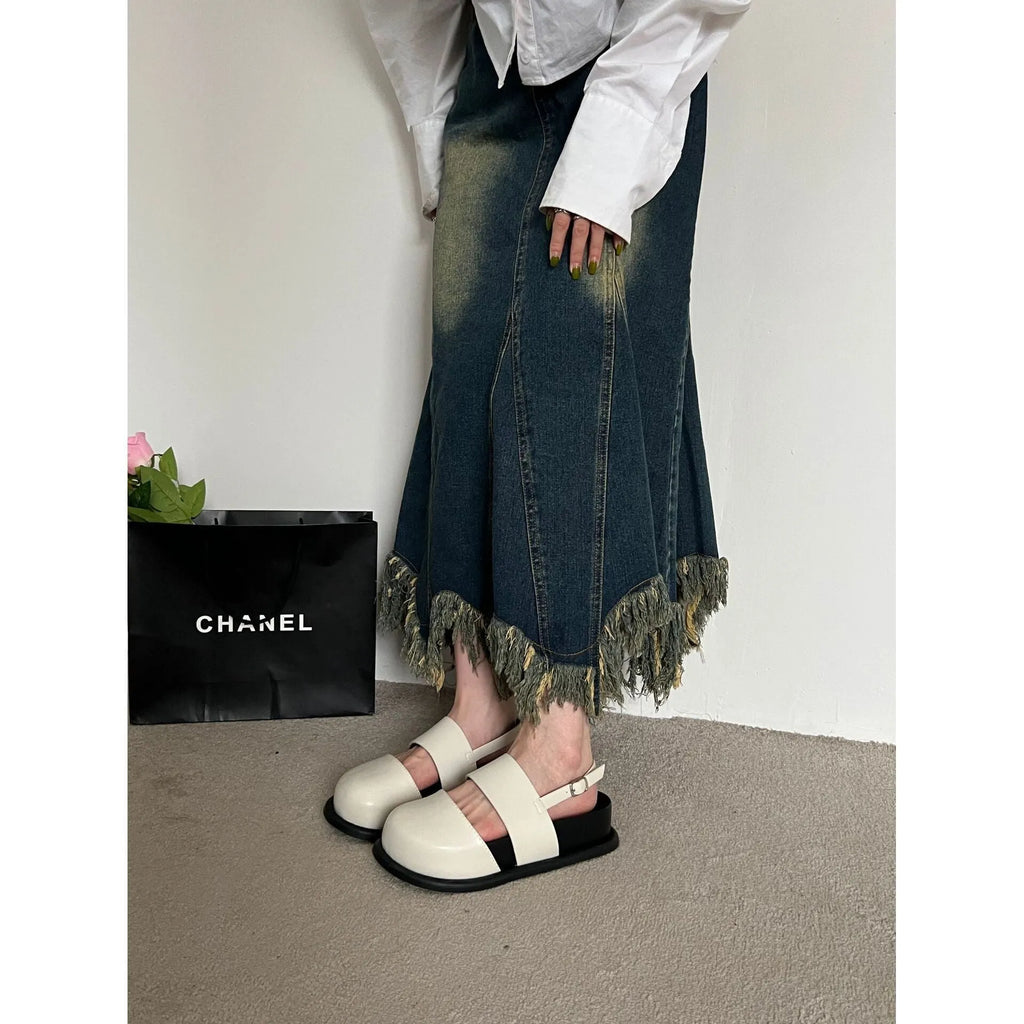 Retro women's closed toe sandals with an adjustable ankle buckle strap in apricot colour.