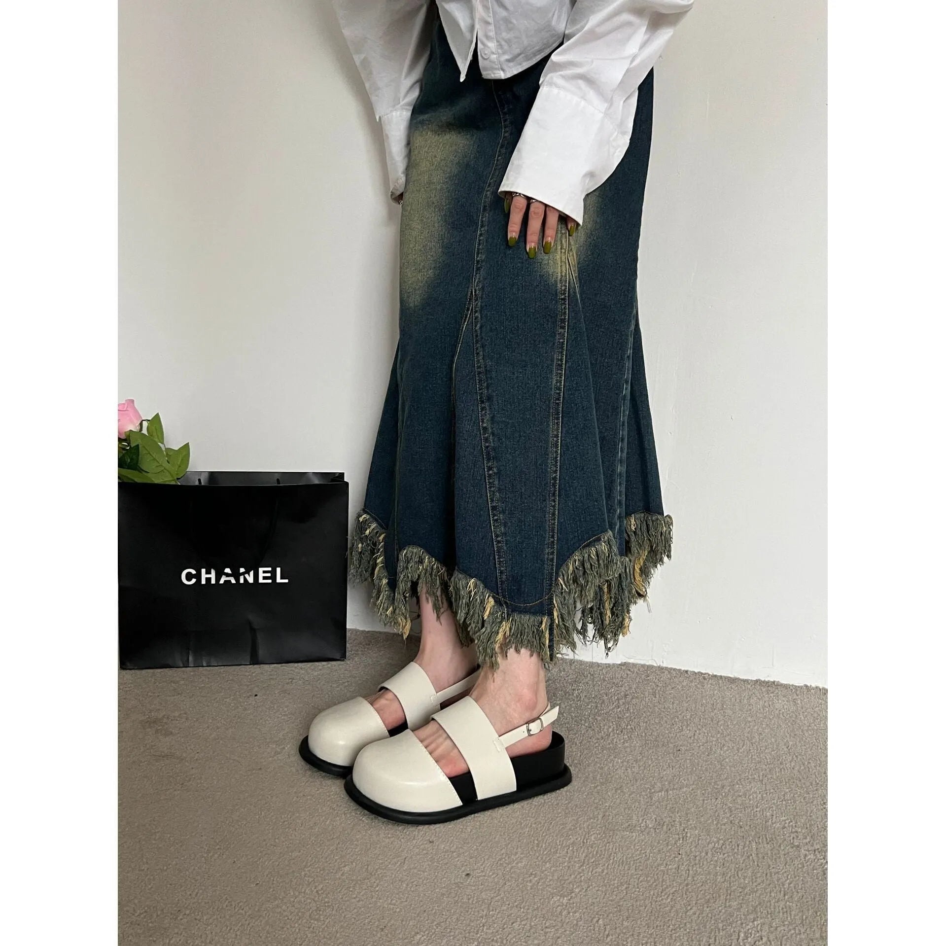 Retro women's closed toe sandals with an adjustable ankle buckle strap in apricot colour.