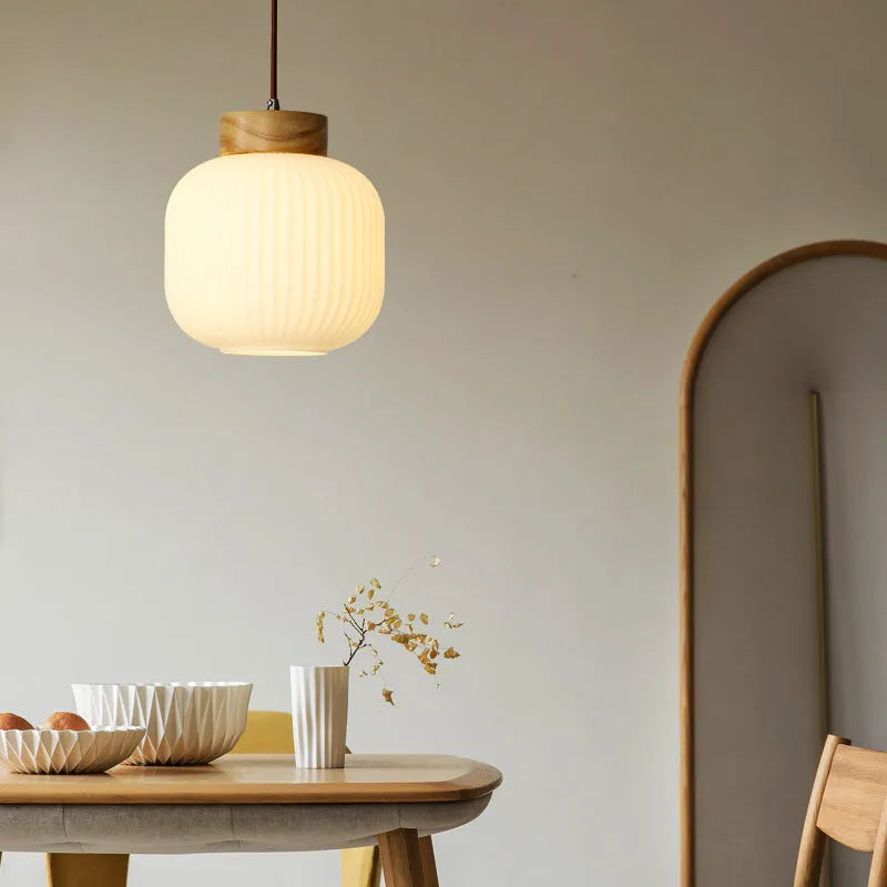 Chinese wooden pendant light with bamboo frame in retro bedroom setting showing three size options
