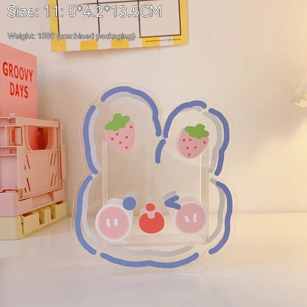 Clear square acrylic desk storage box with a choice of creative designs like strawberry rabbit and bow tie frog.