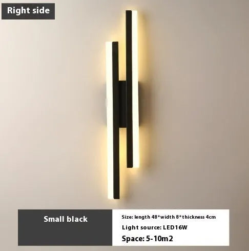 Scandinavian minimalist LED wall light with acrylic shade on black or gold arm.
