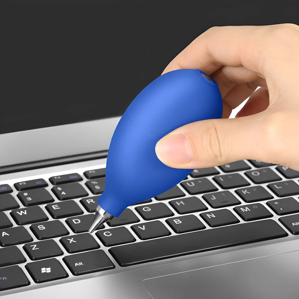 Blue and black rubber air blowing cleaning tool for camera and phone dust removal measuring 9.5cm