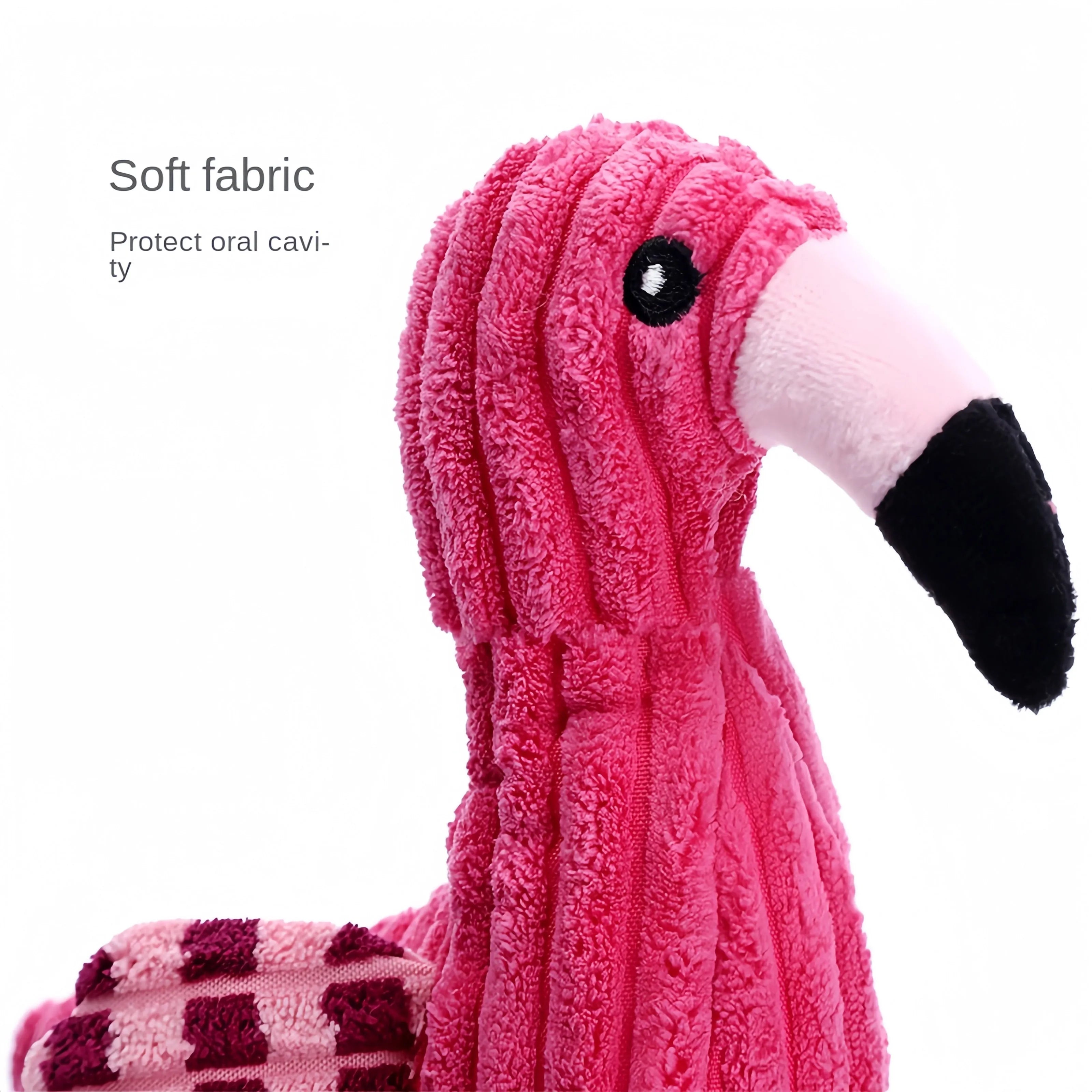 Pink rabbit-shaped corduroy plush dog toy with squeaker inside