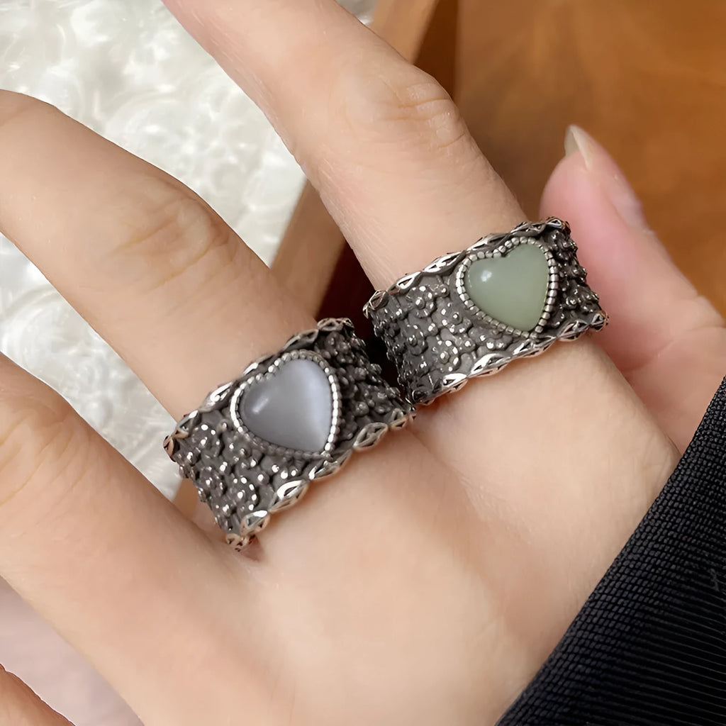 Adjustable opening heart ring in retro wide-faced moonlight style with white copper plated silver construction