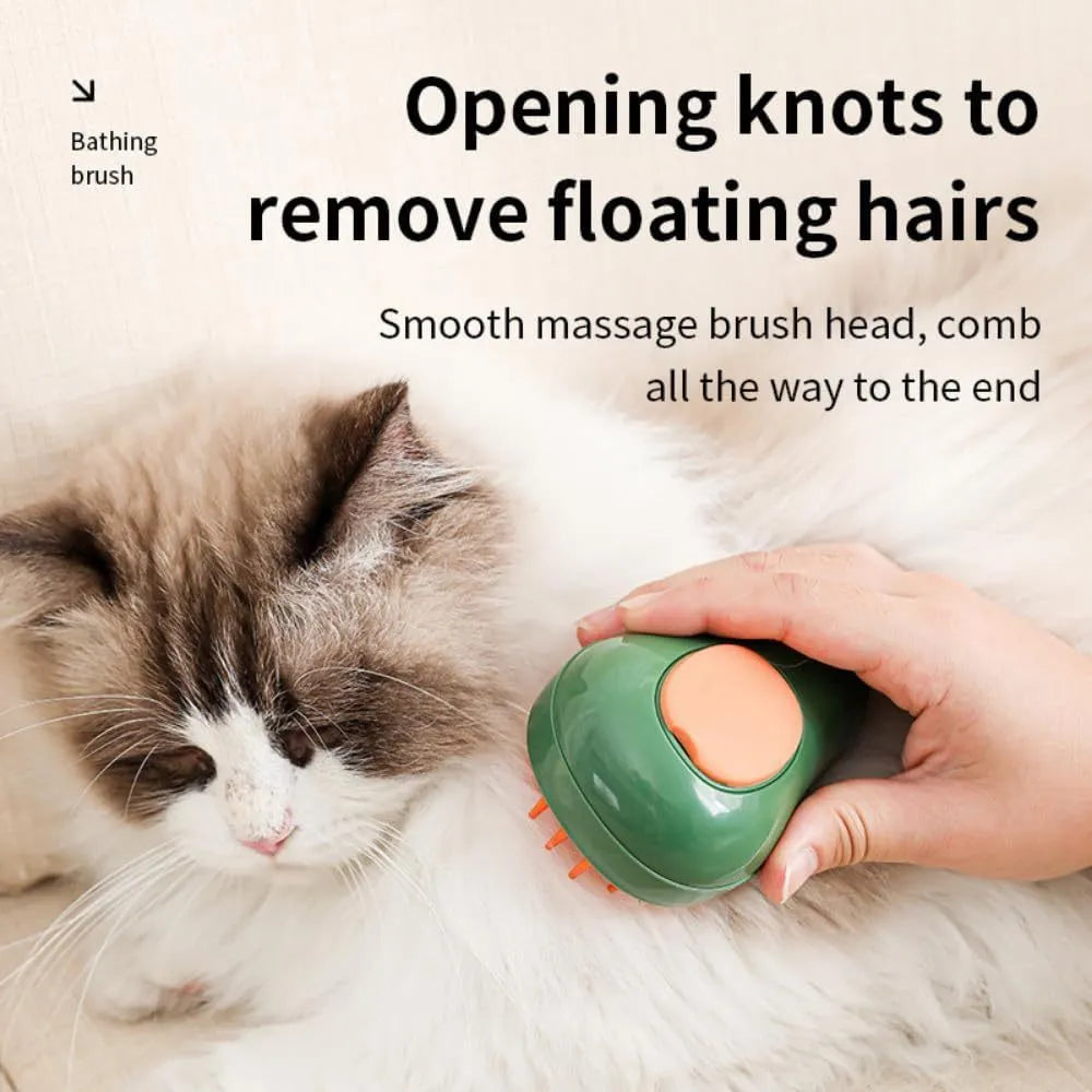 Green and white rechargeable cat steam brush with soft silicone teeth on a wooden table