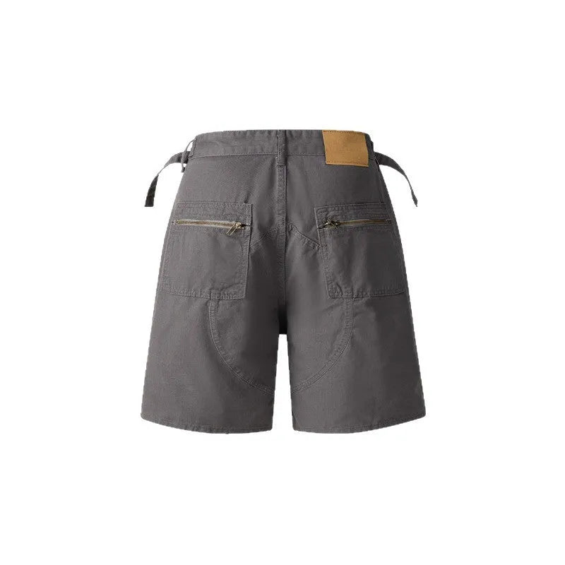 Retro washed cotton workwear shorts in a loose fit, shown in grey, green, camouflage, or blue colour.