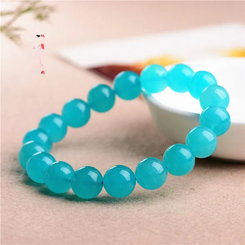 7A grade Amazonite natural stone scattered beads in various sizes from 6mm to 13mm with polished surfaces