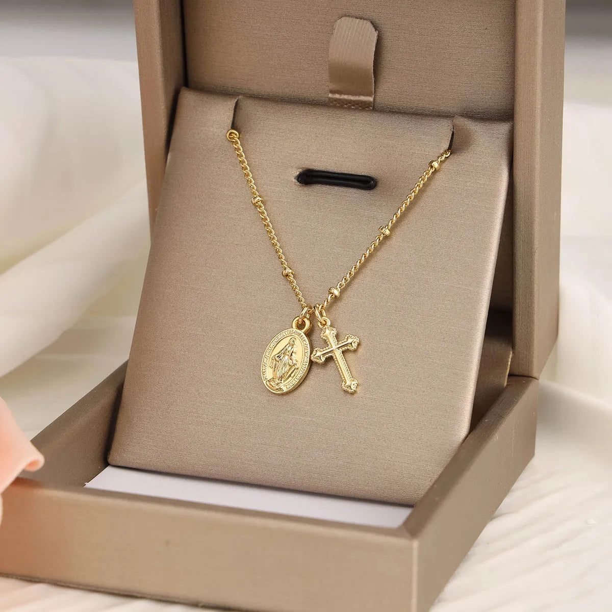 Gold geometric cross Virgin Mary necklace pendant on chain for women's religious jewellery