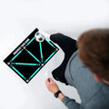 Black football training mat measuring 60cm by 90cm with non-slip surface for sports practice