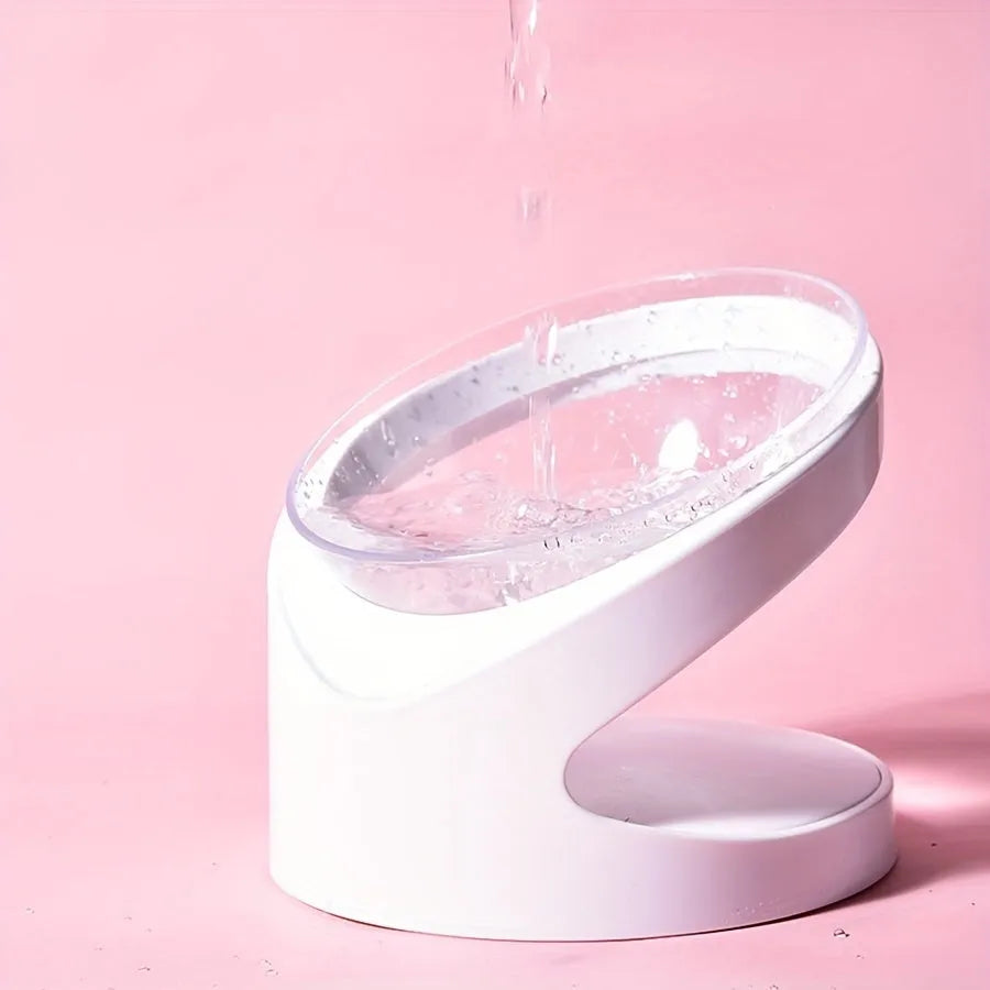 White elevated tilt cat food bowl made from clear durable plastic.
