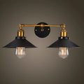 Black iron retro industrial style wall lamp with two adjustable light heads.