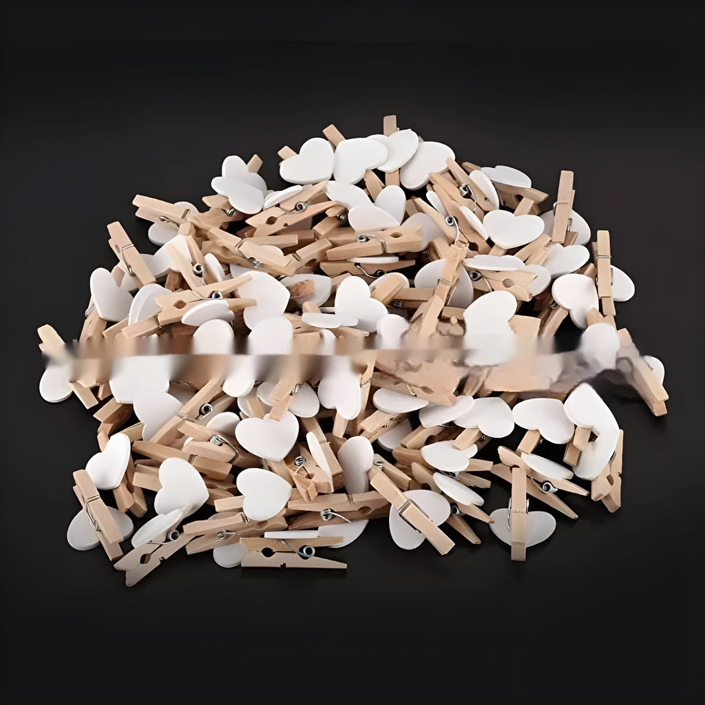Set of five handmade solid wood heart-shaped clips in red, pink, white, and yellow.