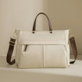 Women's Oxford cloth briefcase with shoulder strap showing open pocket organisation and contrast stitching details