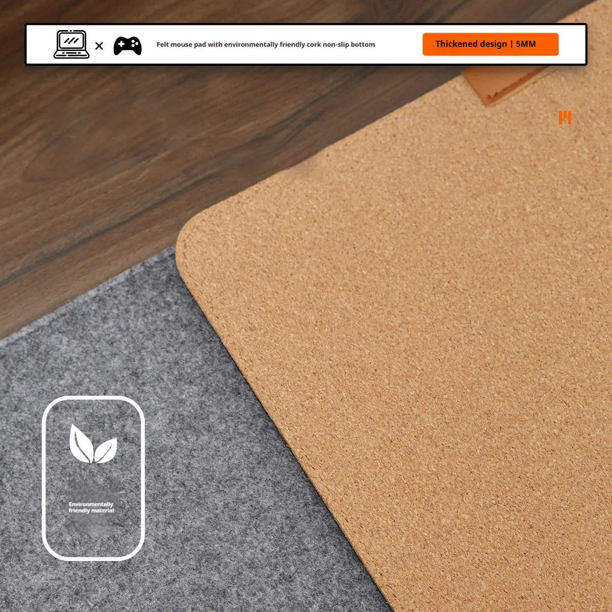 Oversized felt cork desk mouse mat in black and grey pattern, shown on a wooden desk.