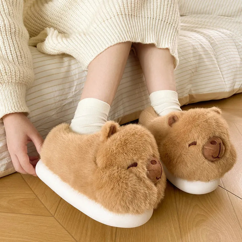 Light brown women's plush winter slippers with cartoon pattern, artificial wool lining and PVC soles