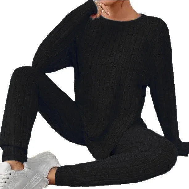 Sunken stripe two-piece homewear set in black or blue with matching pants and top for exercise