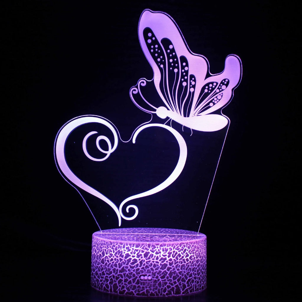 Colourful 3D acrylic USB table lamp with touch control and compact rectangular base.
