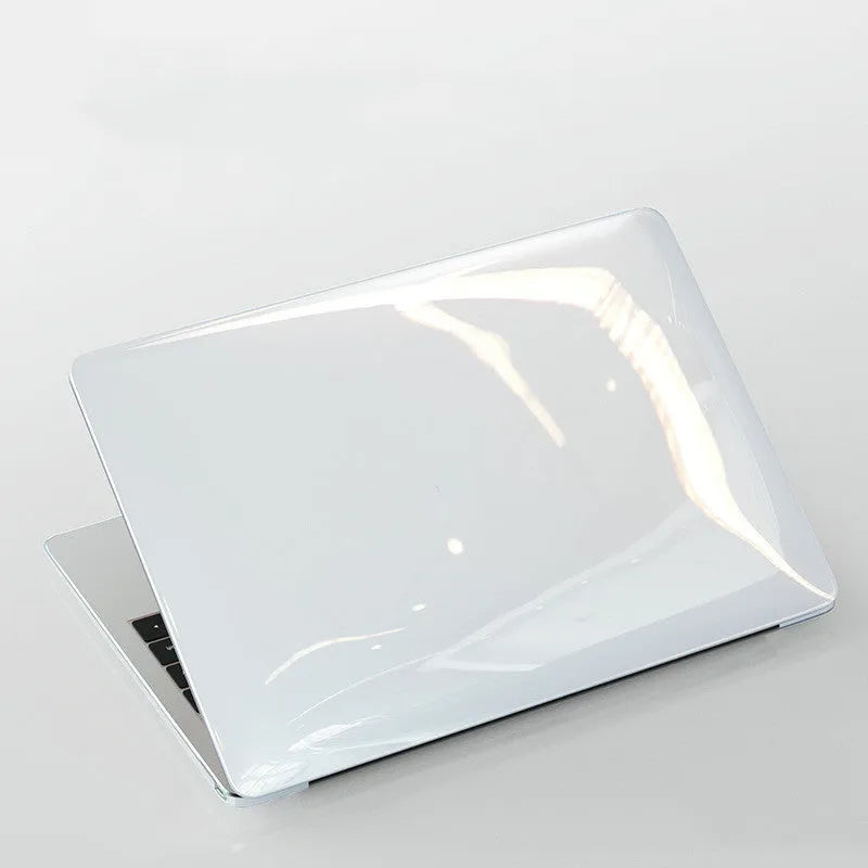 MacBook Pro protective hard shell case in transparent and black options for 14.2-inch and 16.2-inch models