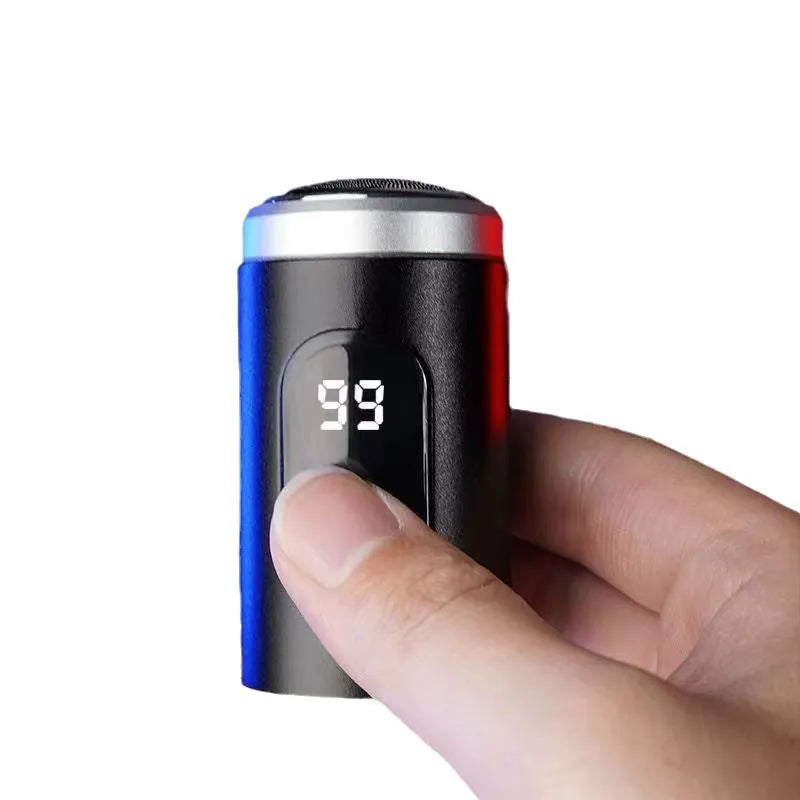 Black portable USB rechargeable shaver with cleaning brush and protective cover.