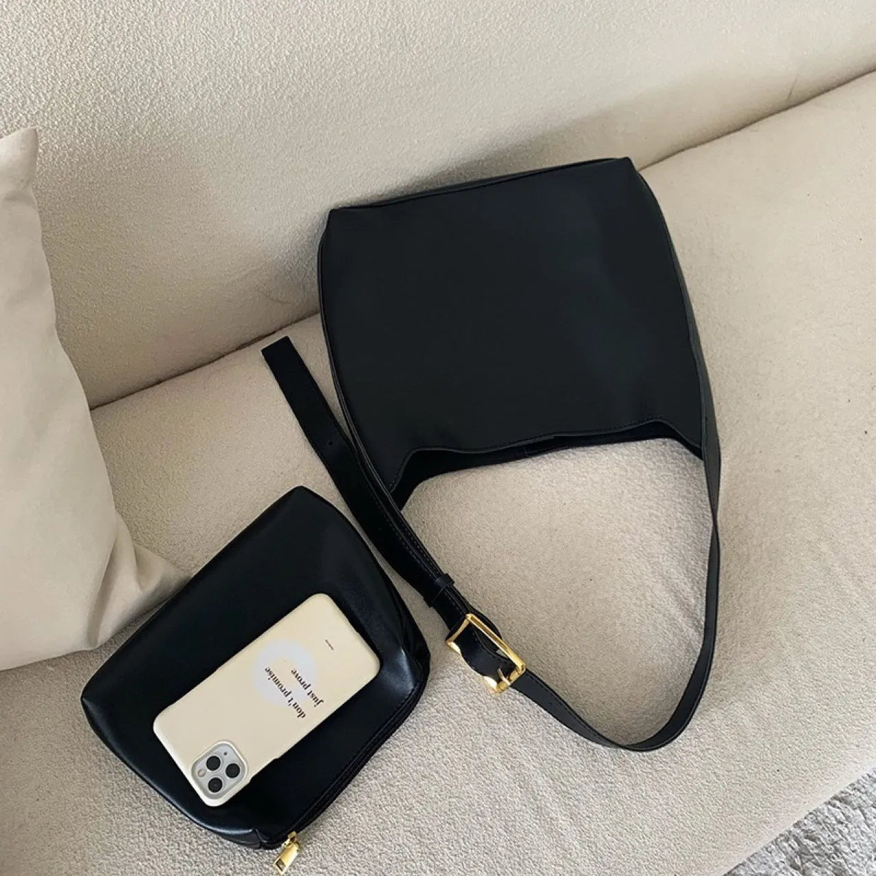 Soft black and brown PU leather ladies shoulder bags with swing thread decorative detail.