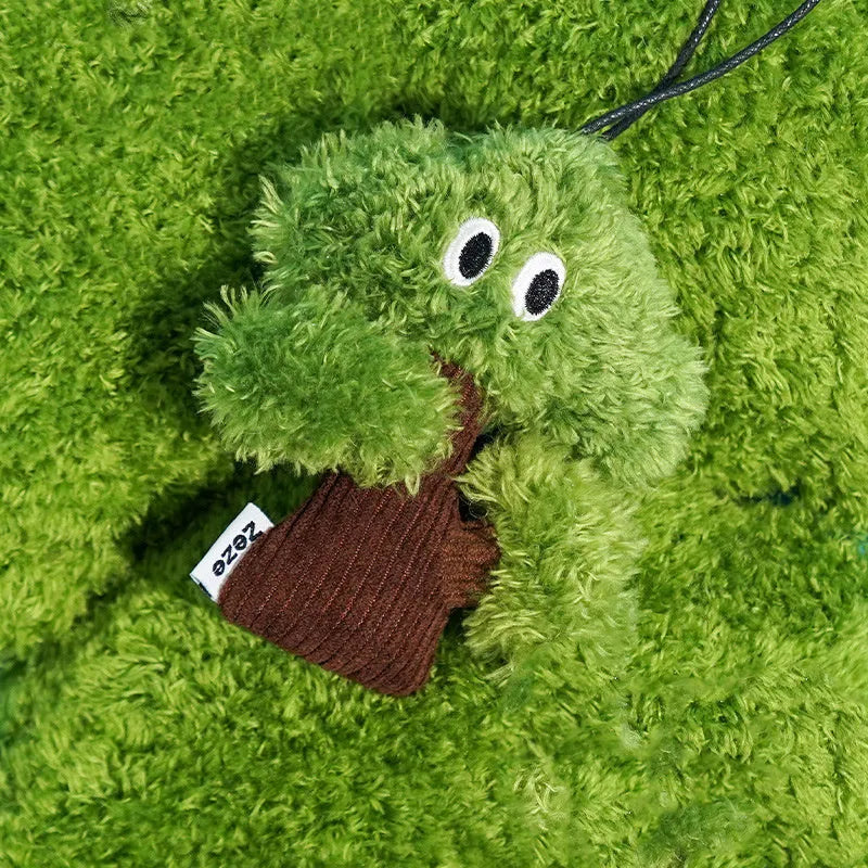 Pine tree shaped cat chew toy pendant that doubles as a tease stick.