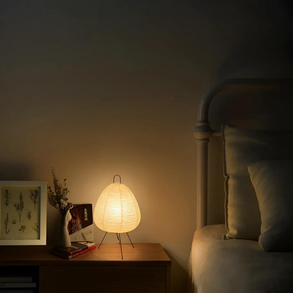 Japanese style rice paper table lamp with handmade shade on aluminium base showing three-tone dimming button