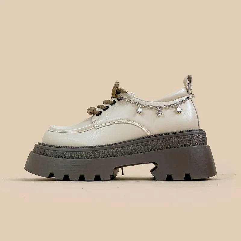White platform leather Mary Jane shoes with round toe, lace-up front, and a thick 6-8cm chunky heel.