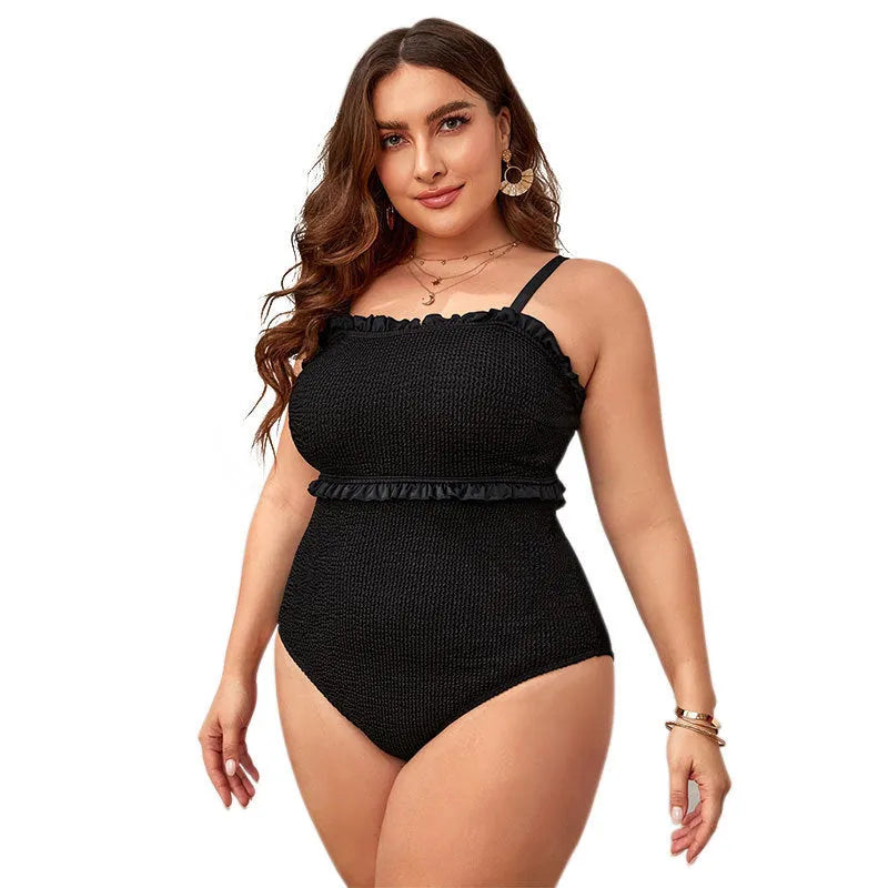 Black plus-size one-piece swimsuit with double shoulder straps and a cover belly design.