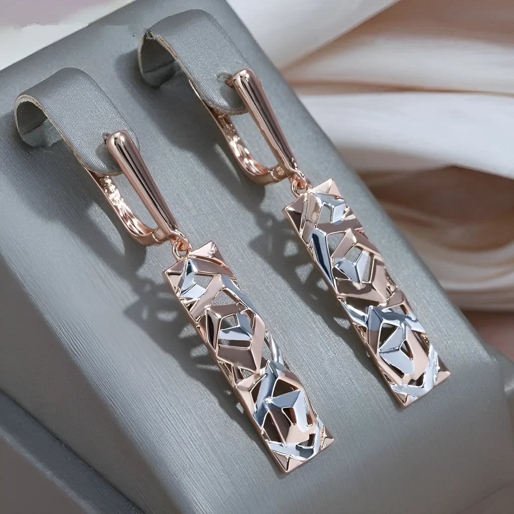 Rectangular two-tone hollow stud earrings with geometric design and silver electroplated finish